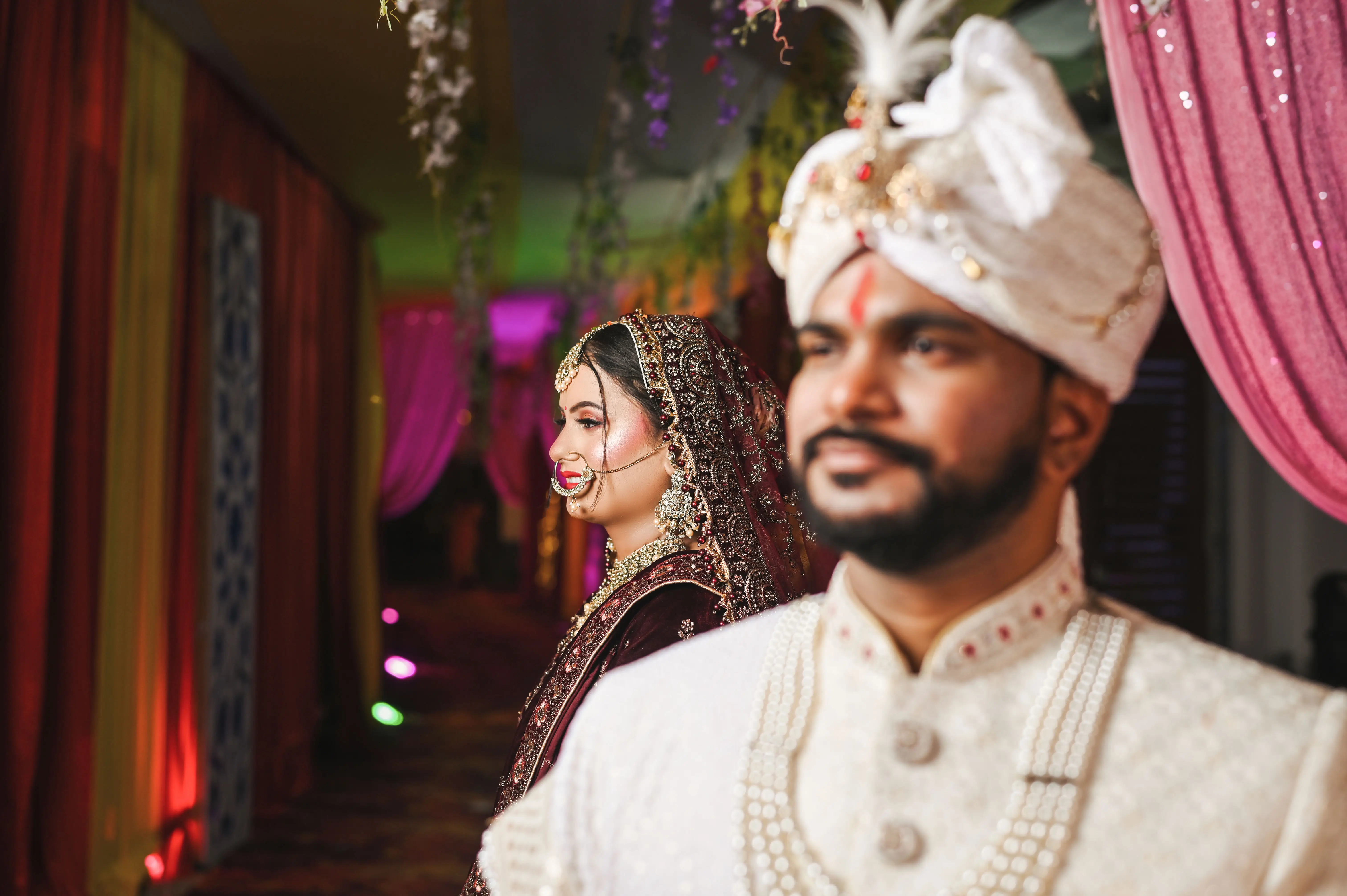 Stunning engagement portrait of Aprajita & Adarsh with a dreamy backdrop.